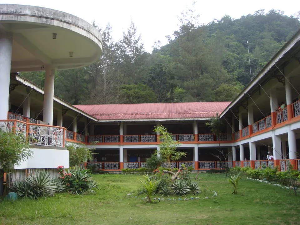 ASCOT academic building amid tropical greenery